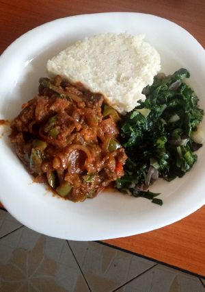 A picture of Sweet and sour beef and creamed spinach.