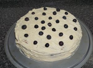 Una foto de Queque de arándanos con glaseado de queso crema