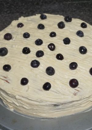 Una foto de Queque de arándanos con glaseado de queso crema