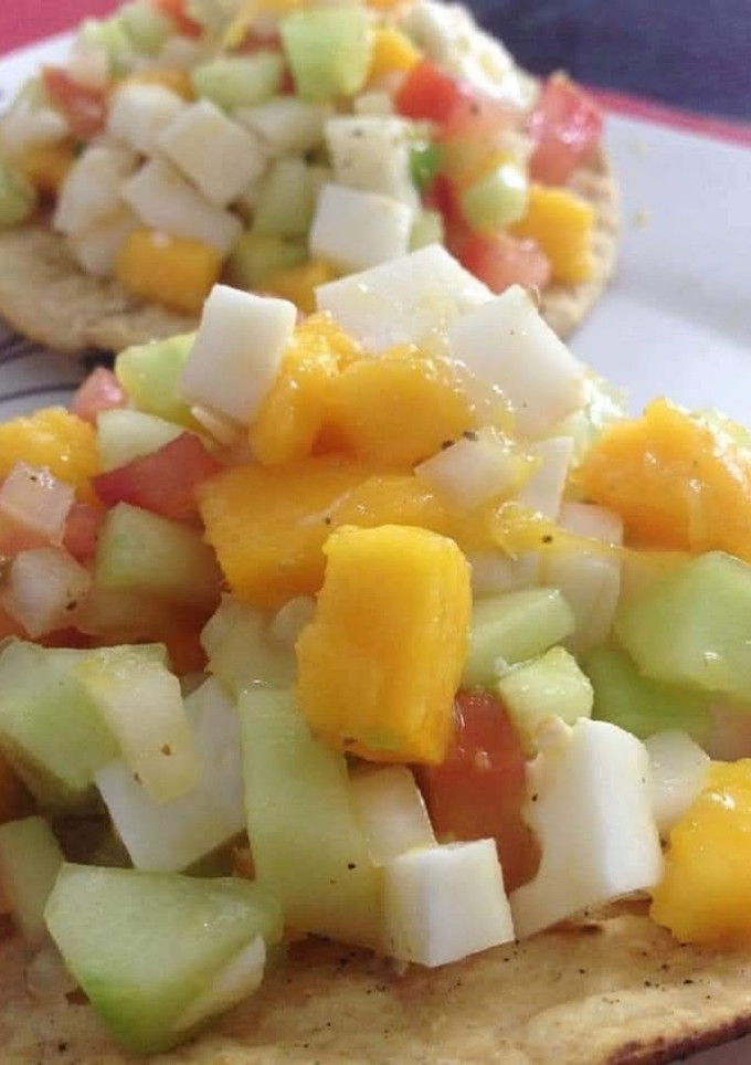 Una foto de Ceviche de Coco y Mango