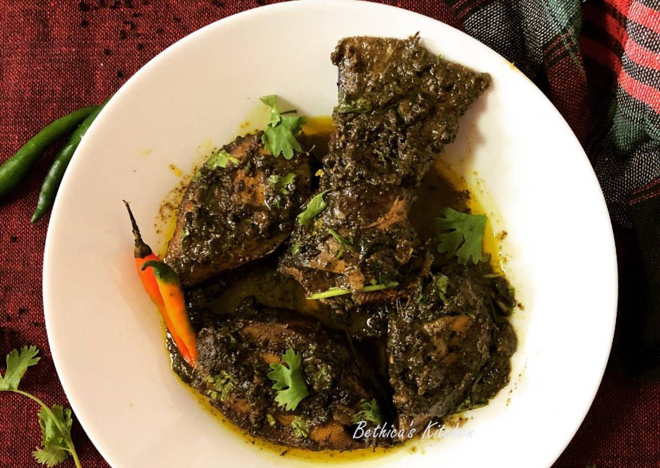 Ilish Macher Kalo Jhaal (Hilsa Fish cooked with Nigella Seeds paste)