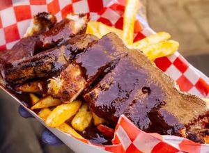 Una foto de Ribs de cerdo con salsa BBQ