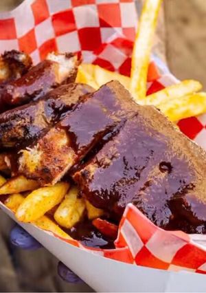 Una foto de Ribs de cerdo con salsa BBQ