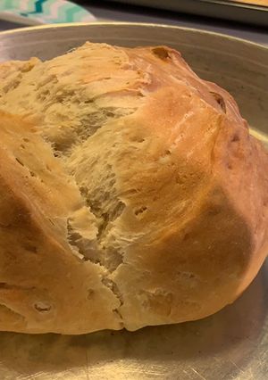 A picture of Baked bread with olives.