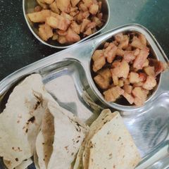 A picture of Aloo sabzi with Roti.