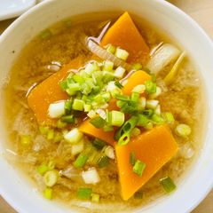 A picture of Pumpkin Miso Soup with sweet onions.