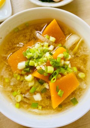 A picture of Pumpkin Miso Soup with sweet onions.