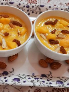 आम रस (aam ras recipe in Hindi) रेसिपी मुख्य फोटो