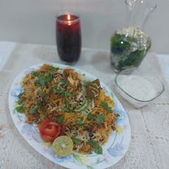 A picture of Chicken tikka masala biryani.
