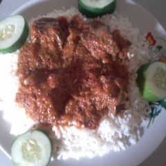 A picture of White Rice and Carrot Stew.