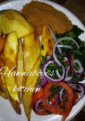 A picture of Fried potatoes,Vegetables and Groundnuts cake.