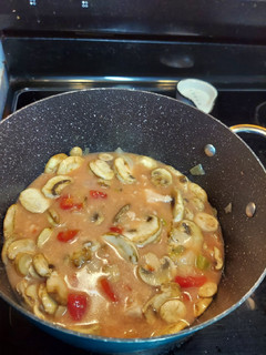 A picture of Chicken and mushroom soup.