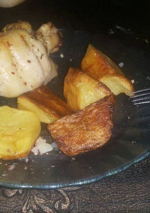 Una foto de Pollo al horno con papas