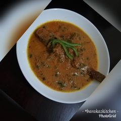 A picture of Fish in coconut stew.