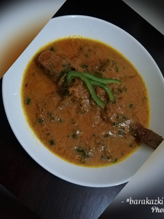 A picture of Fish in coconut stew.