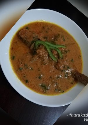 A picture of Fish in coconut stew.