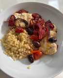 Baked Italian cod with cherry tomatoes, olives and peppers