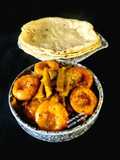 Jowar Roti With Gavar Dhokli Sabzi - Jowar Roti With Clusterbeans Flat Dumplings Curry