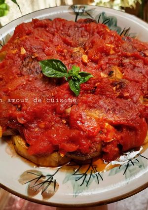 Une photo de Aubergines à la sauce tomate 🍅 🍆