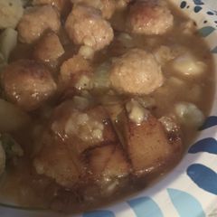 A picture of Meatballs over Potatoes.