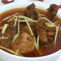 A picture of Smoky Chicken Qorma.