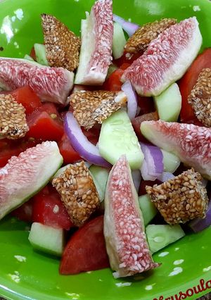 A picture of Tomato, Cucumber, Fig, and Melekouni Salad.