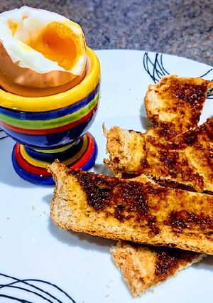 A picture of Dippy Egg and Marmite Soldiers.