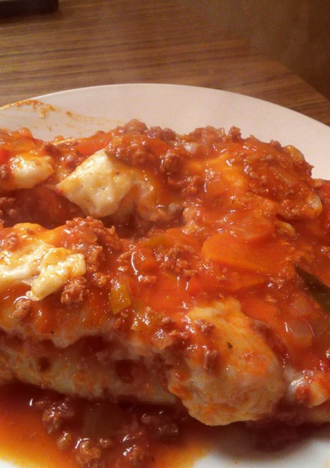 Una foto de Canelones de verdura con salsa roja y salsa bechamel