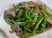 A picture of stir fried green peppers