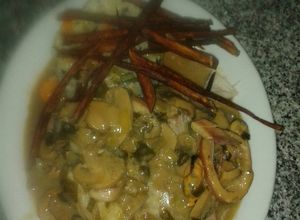 Una foto de Abadejo mar y tierra con guarnición timbal de arroz