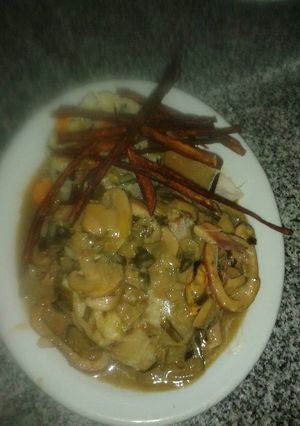 Una foto de Abadejo mar y tierra con guarnición timbal de arroz