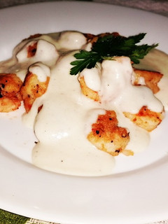 Una foto de Camarones con Salsa bechamel a la Alexito