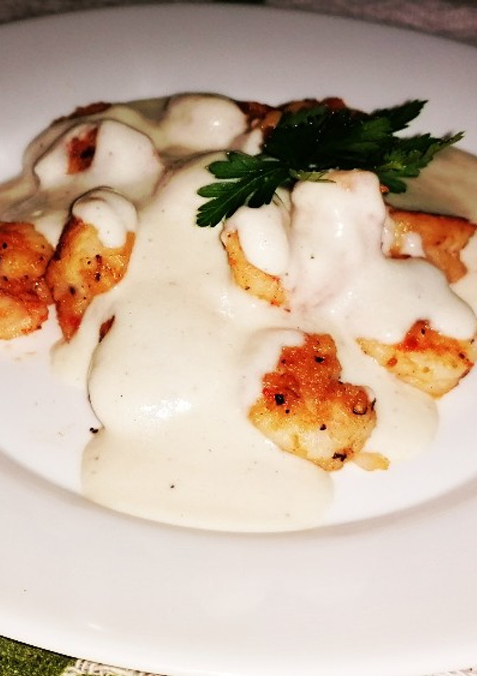 Una foto de Camarones con Salsa bechamel a la Alexito