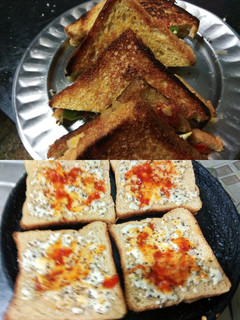 A picture of Chicken sandwich with cheesy garlic bread.