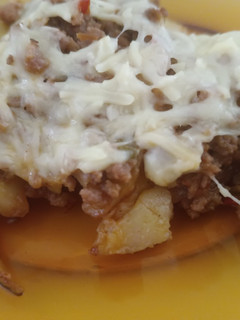 Una foto de Papas con carne picada al horno