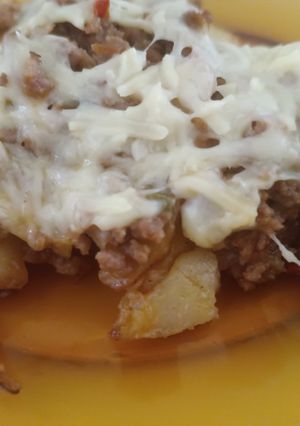 Una foto de Papas con carne picada al horno