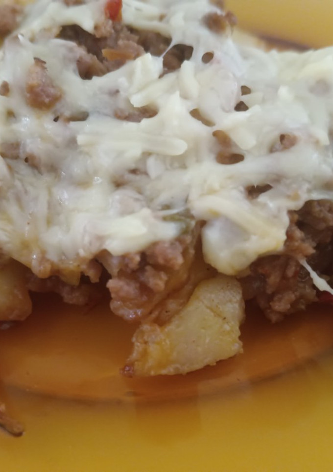 Una foto de Papas con carne picada al horno