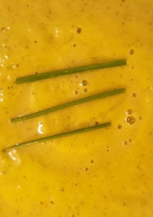 Une photo de Velouté de courgettes pimenté au parmesan