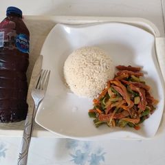 A picture of Coconut rice & vegetable sauce.
