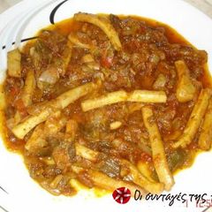 A picture of Braised calamari in tomato sauce.