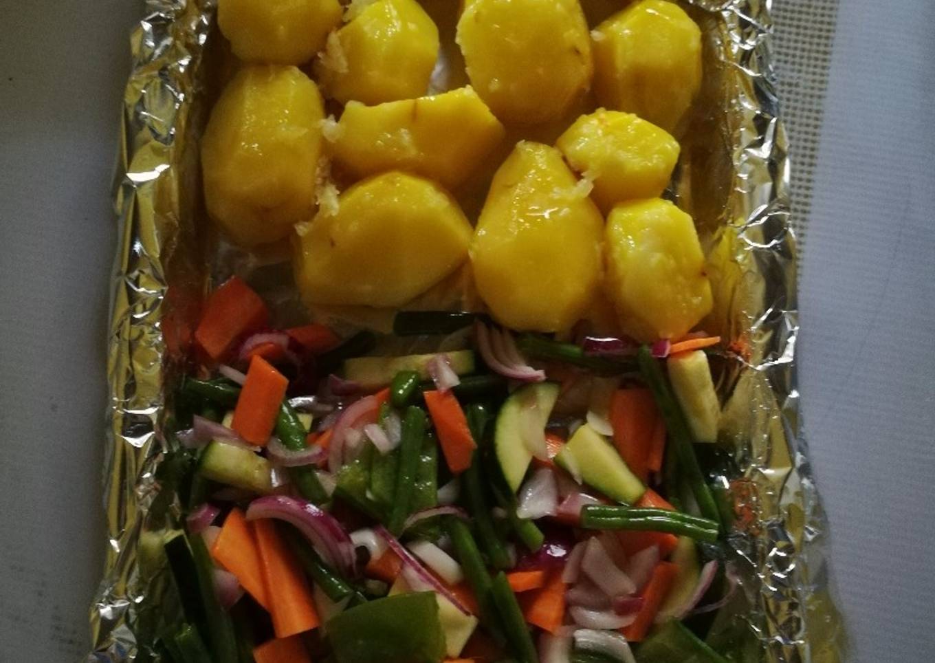 Baked potatoes and vegetables