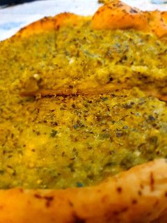 Una foto de Tarta de zapallito, puerro, cebolla y queso muzzarella