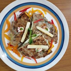A picture of Butter cheese egg paratha.