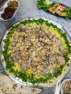 صورة لوصفة منسف اردني على اصوله