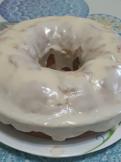 Una foto de Budín de Mandarina bañado con Glasé