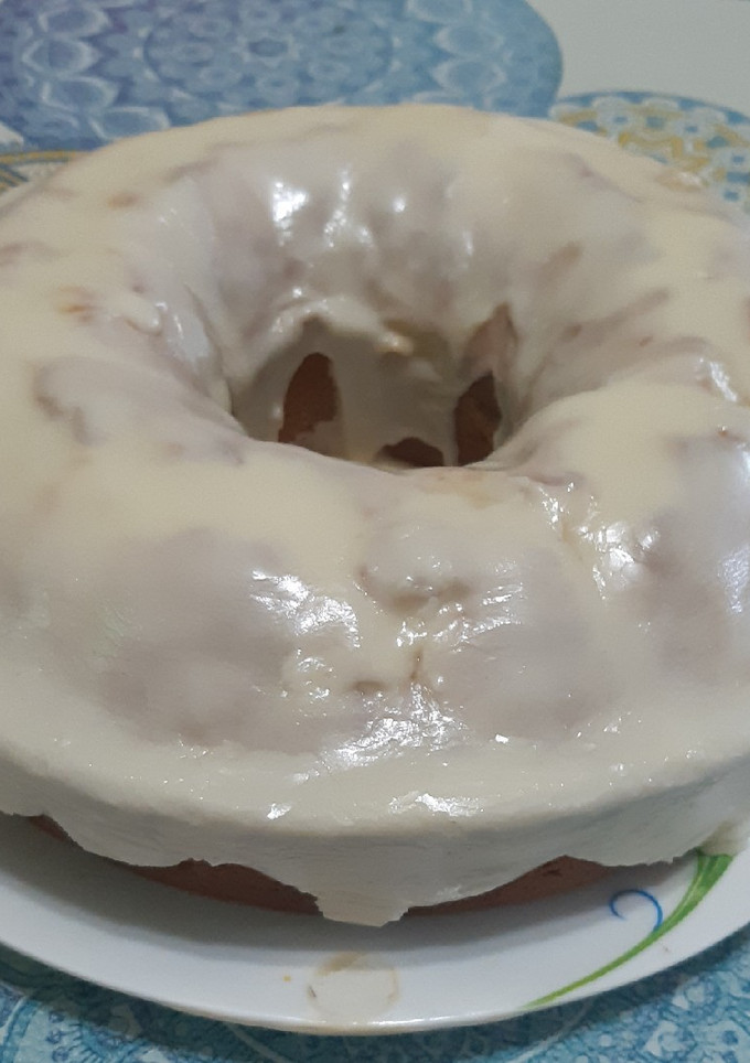 Una foto de Budín de Mandarina bañado con Glasé