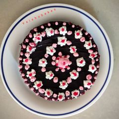 A picture of Dark Chocolate Cake with Strawberry Cream.