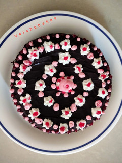 A picture of Dark Chocolate Cake with Strawberry Cream.