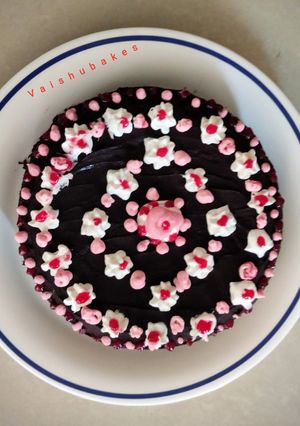 A picture of Dark Chocolate Cake with Strawberry Cream.
