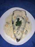 Poblano relleno de queso en salsa de jocoque
